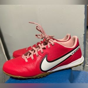 Pink Nike Tiempo indoor soccer shoes